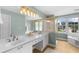 Light and airy bathroom with double vanity, shower, and large soaking tub at 2865 Ivey Oaks Ln, Roswell, GA 30076
