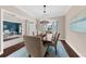 Charming dining room adjacent to office, with hardwood floors and a lovely chandelier at 2865 Ivey Oaks Ln, Roswell, GA 30076