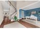 Inviting foyer with hardwood floors, a staircase, and views into the office and dining areas at 2865 Ivey Oaks Ln, Roswell, GA 30076