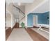 Spacious foyer with a staircase, chandelier, and views into dining and office areas at 2865 Ivey Oaks Ln, Roswell, GA 30076