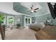 Inviting bedroom boasting many windows, seating, and calming colors at 2865 Ivey Oaks Ln, Roswell, GA 30076