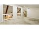 Bright loft area featuring carpet, neutral paint and a staircase at 600 Ponderosa Ct, Fayetteville, GA 30214
