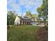 Charming new construction home with a manicured lawn and a three car garage at 6093 Wayarer Dr, Villa Rica, GA 30180