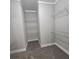 Functional walk-in closet equipped with wire shelving for organized storage at 6093 Wayarer Dr, Villa Rica, GA 30180