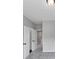 Large bedroom with neutral carpet and paint with access to closets and hallways at 107 Cedar Brook Dr, Canton, GA 30115