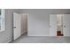 Spacious bedroom with neutral carpet and paint with access to closets and bathroom at 107 Cedar Brook Dr, Canton, GA 30115