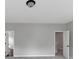 Bedroom with neutral walls and carpeted floors featuring a closet and doorway at 107 Cedar Brook Dr, Canton, GA 30115