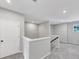Landing area with gray walls, a window, and carpet flooring at 107 Cedar Brook Dr, Canton, GA 30115