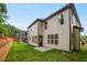 Two-story home featuring a back yard and green space at 2432 Whites Rdg, Decatur, GA 30034