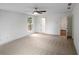 Spacious bedroom with neutral carpet, ample natural light, and a ceiling fan, creating a comfortable retreat at 2432 Whites Rdg, Decatur, GA 30034