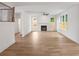 Spacious living room with hardwood floors, a fireplace, and natural light at 2432 Whites Rdg, Decatur, GA 30034