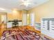 Spacious room with ceiling fan, desk, and a view of the outside at 2810 Promenade Pl, Buford, GA 30519