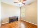 Cozy bedroom featuring beautiful hardwood floors and a music player at 2810 Promenade Pl, Buford, GA 30519