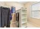 Walk-in closet with organizers and ample storage space at 2810 Promenade Pl, Buford, GA 30519