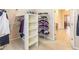 Bright, organized walk-in closet with ample storage and shelving at 2810 Promenade Pl, Buford, GA 30519