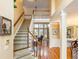 Welcoming entryway with grand staircase and high ceilings at 2810 Promenade Pl, Buford, GA 30519