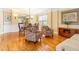 Cozy living room featuring hardwood floors, natural light, and elegant furnishings at 2810 Promenade Pl, Buford, GA 30519