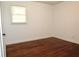 Bedroom with hardwood floors, natural light and crisp white walls at 579 Kenridge Cir, Stone Mountain, GA 30083
