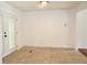 Entryway with tile flooring and a white paneled front door, bright and spacious at 579 Kenridge Cir, Stone Mountain, GA 30083