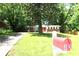 Brick home with a red front door and neatly kept lawn, mailbox included at 579 Kenridge Cir, Stone Mountain, GA 30083
