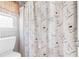 Cozy bathroom with decorative shower curtain at 65 Millennial Ct, Lawrenceville, GA 30045