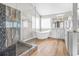 Elegant bathroom featuring a modern shower, large soaking tub, and double vanity at 65 Millennial Ct, Lawrenceville, GA 30045
