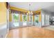 Bright dining room with a view of the pool and access to the backyard at 65 Millennial Ct, Lawrenceville, GA 30045