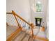 Bright entryway with a staircase, chandelier, and large window above the front door at 65 Millennial Ct, Lawrenceville, GA 30045