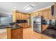 Well-equipped kitchen featuring stainless steel appliances and generous counter space at 65 Millennial Ct, Lawrenceville, GA 30045