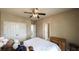 Bedroom view shows the walk-in closets and ceiling fan at 208 Eagles Flight, Villa Rica, GA 30180