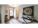 Inviting foyer features hardwood floors, stylish decor, and a warm, welcoming ambiance at 208 Eagles Flight, Villa Rica, GA 30180