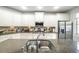 Updated kitchen showcasing granite counters, stainless steel appliances and stylish cabinets at 208 Eagles Flight, Villa Rica, GA 30180