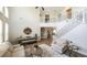 Spacious living room featuring a two-story ceiling, natural light, and comfortable furnishings at 208 Eagles Flight, Villa Rica, GA 30180