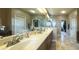 Bathroom featuring a double vanity with lots of storage and large mirror at 208 Eagles Flight, Villa Rica, GA 30180