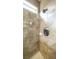 Neutral tiled shower with rainfall showerhead at 208 Eagles Flight, Villa Rica, GA 30180