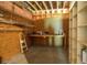 Unfinished basement with built in workbench and shelving, ready to be finished to suit your needs at 2997 Happy Hollow Se Dr, Conyers, GA 30094