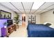 Bedroom with a media center, a closet, and a decorative plant at 2997 Happy Hollow Se Dr, Conyers, GA 30094