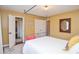 Bedroom with a four-poster bed and ensuite access at 2997 Happy Hollow Se Dr, Conyers, GA 30094