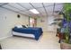 Bedroom with a bed, a media center, and two closets at 2997 Happy Hollow Se Dr, Conyers, GA 30094