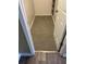 Cozy carpeted closet featuring a wood floor transition strip at 2997 Happy Hollow Se Dr, Conyers, GA 30094