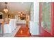 Inviting home entryway with hardwood floors, adjacent dining and living room areas at 2997 Happy Hollow Se Dr, Conyers, GA 30094