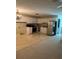 Open kitchen area with white cabinets and stainless-steel appliances at 2997 Happy Hollow Se Dr, Conyers, GA 30094