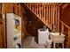 Basement laundry area featuring a utility sink, shelving, and convenient washer and dryer hookups at 2997 Happy Hollow Se Dr, Conyers, GA 30094