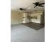Inviting living room open to kitchen with ceiling fans and modern flooring, providing ample natural light at 2997 Happy Hollow Se Dr, Conyers, GA 30094
