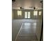 Bright open layout with spacious living room and kitchen, offering modern flooring and lots of light at 2997 Happy Hollow Se Dr, Conyers, GA 30094