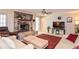 Spacious living room features a stone fireplace and neutral color scheme at 2997 Happy Hollow Se Dr, Conyers, GA 30094
