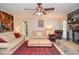 Spacious living room with stone fireplace and traditional furnishings at 2997 Happy Hollow Se Dr, Conyers, GA 30094