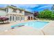 Back of home with an in-ground pool and diving board at 2997 Happy Hollow Se Dr, Conyers, GA 30094