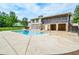 Home exterior showing a screened-in porch and pool area at 2997 Happy Hollow Se Dr, Conyers, GA 30094