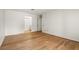 Spacious bedroom featuring wood flooring and two closets at 403 Abingdon Way, Atlanta, GA 30328